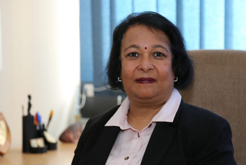 A photo of the summary author, Tanusha Raniga.